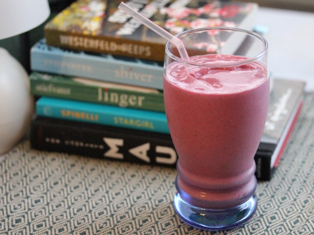 The yet-to-be-named smoothie next to a pile of used books my wife recently bought for her classroom.